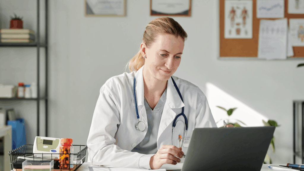 Clinician using a clinical information system to review patient records